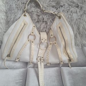White and gold leather bag